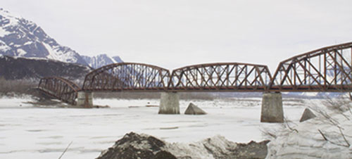 The Million Dollar Bridge, built for $1.4 million and completed in 1910, was the largest construction challenge of the Copper River and Northwestern Railway. The northern span fell in 1964 during the Good Friday Earthquake. Photo by Ned Rozell.
